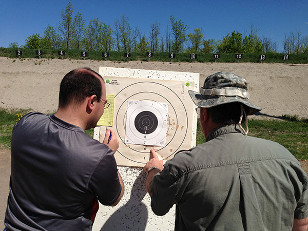 Scoring an NRA timed/rapid fire target during a match at Connaught.
